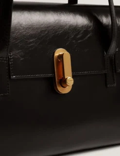 Baguette-Tasche aus geknittertem Leder mit Drehverschluss