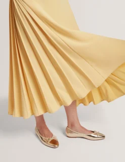 Ballerinas aus Metallic-Leder mit Schleife