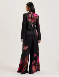 Bedruckter Jumpsuit mit Bindekragen und weitem Bein