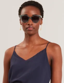 Übergroße Sonnenbrille mit Katzenaugen- und Schleifendetail
