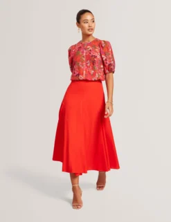 Bluse mit Blütenmuster und Puffärmeln