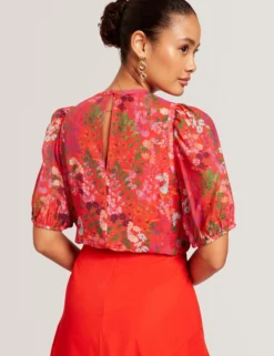 Bluse mit Blütenmuster und Puffärmeln