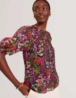 Bluse mit Blütenmuster und Puffärmeln