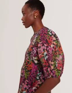 Bluse mit Blütenmuster und Puffärmeln