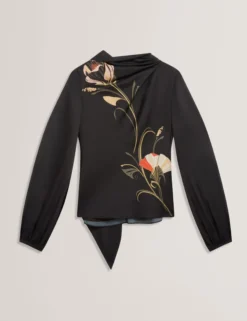 Bluse mit nouveau-wirbelartigem Bindekragen und langen Ärmeln