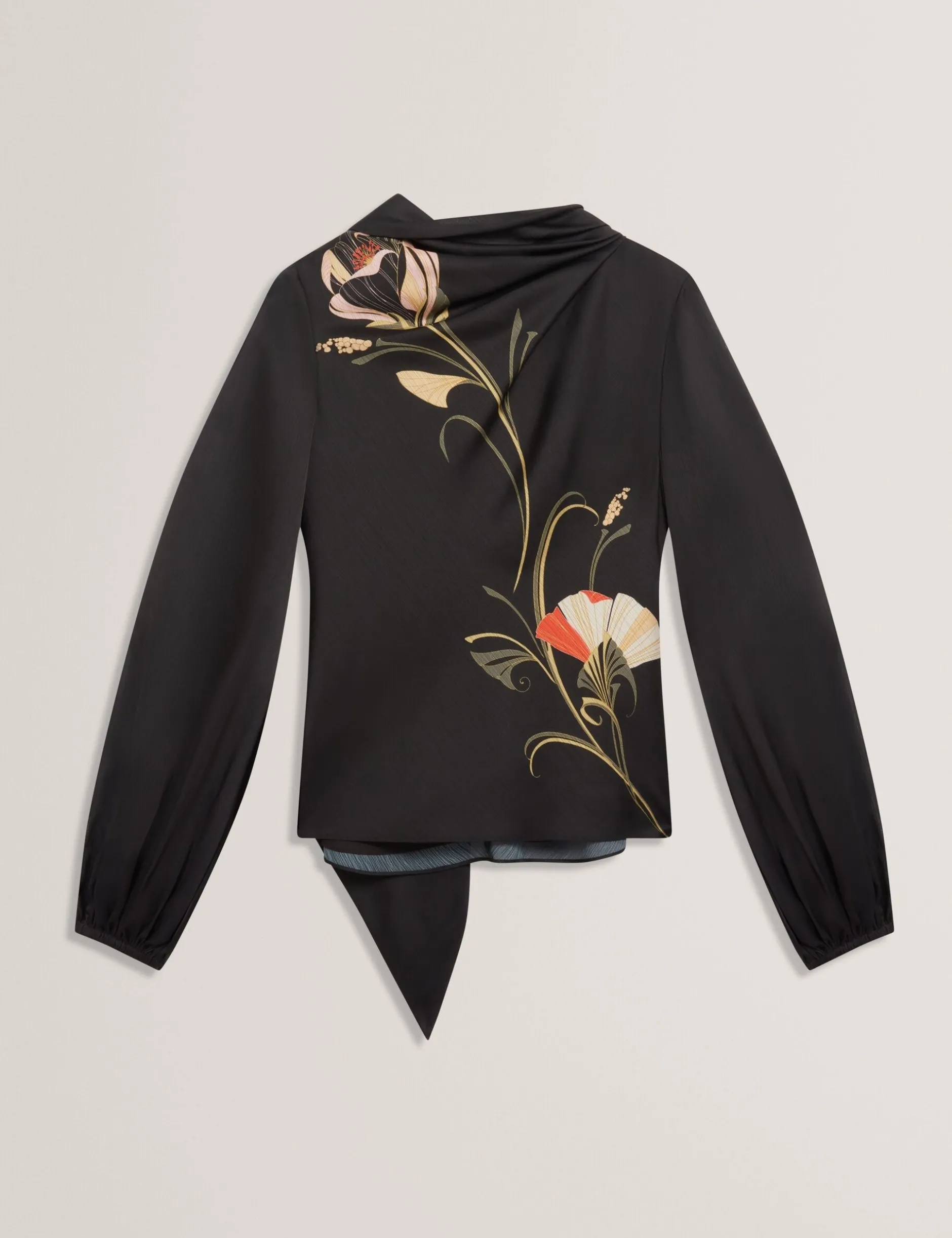 Bluse mit nouveau-wirbelartigem Bindekragen und langen Ärmeln