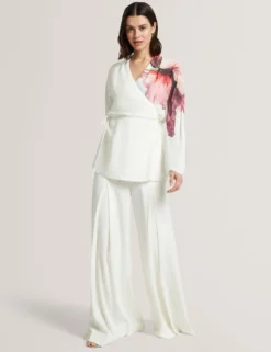 Bluse mit Printdetails, Wickeloptik und langen Ärmeln