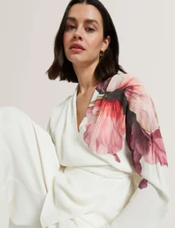Bluse mit Printdetails, Wickeloptik und langen Ärmeln