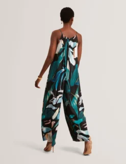 Jumpsuit mit abstraktem Print und weitem Bein