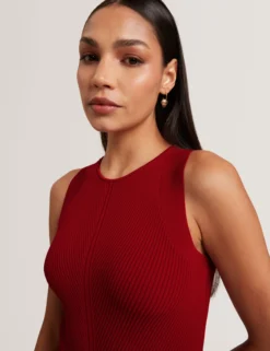 Jumpsuit mit Strickoberteil und geblümtem Hosenaufschlag