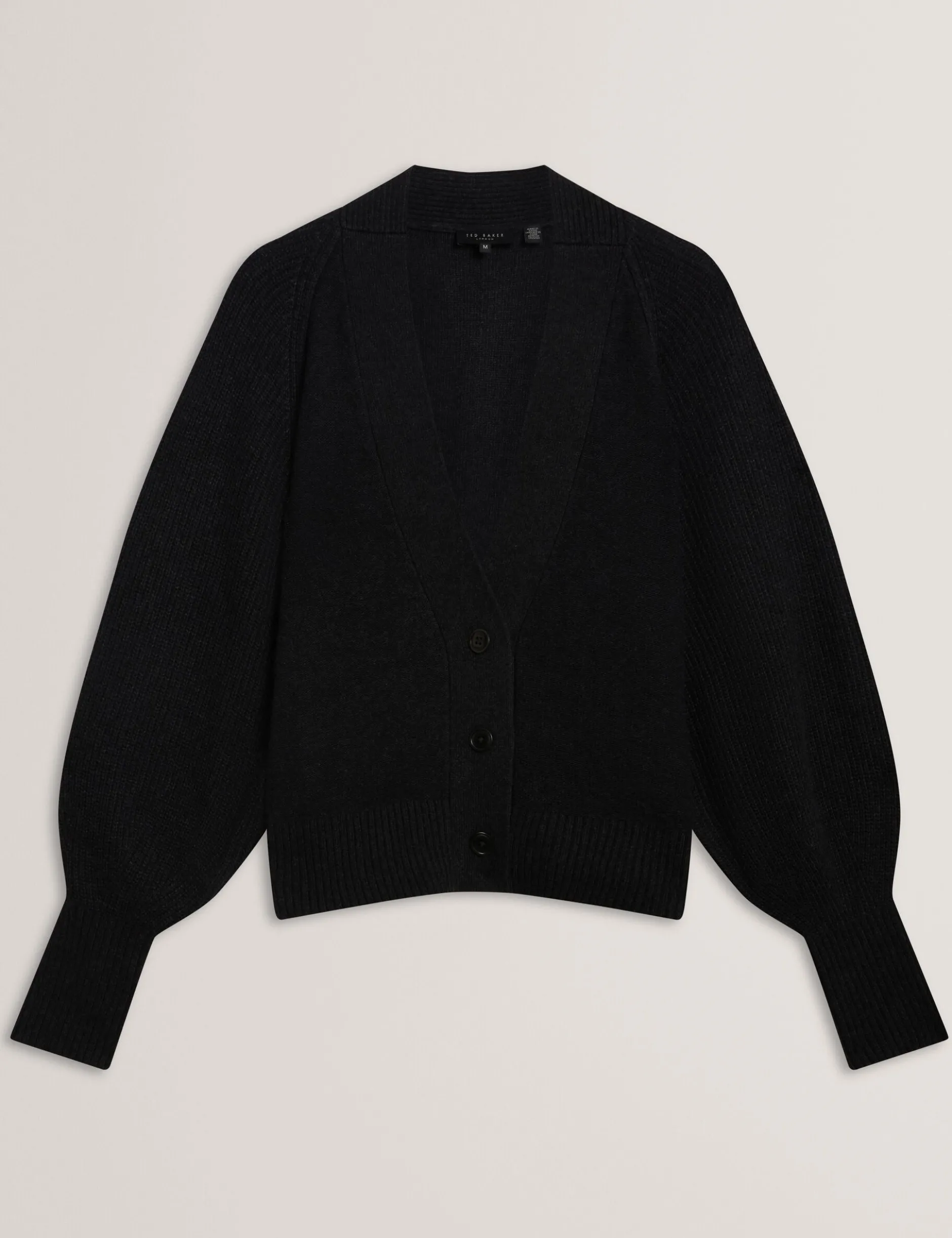 Kastenförmiger Strickcardigan aus Merinowolle mit V-Ausschnitt