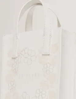 Kleine Tragetasche mit Blumenstickerei und Icon-Muster