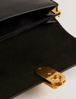 Kleine Umhängetasche aus Leder mit Drehverschluss