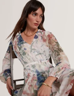 Minikleid mit Blumenmuster, plissiert, langärmelig