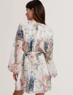 Minikleid mit Blumenmuster, plissiert, langärmelig