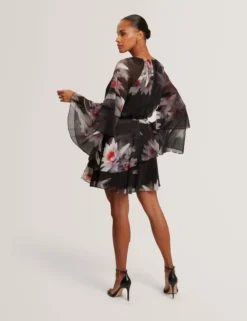 Minikleid mit Lilienmuster, Rüschen und langen Ärmeln