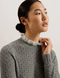 Pointelle-Strickpullover mit Hemdsaum