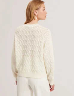 Pointelle Zopfstrickpullover aus Wolle