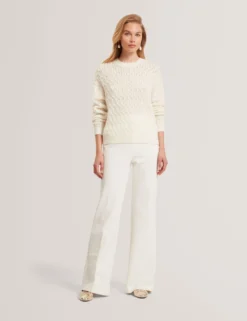 Pointelle Zopfstrickpullover aus Wolle