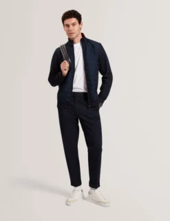 Schmal zulaufende Baumwoll-Stretch-Twill-Hose