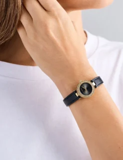 Schmuckbesetzte Gold- und schwarze Lederuhr