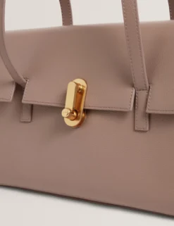 Schultertasche aus Leder mit Drehverschluss im Baguette-Stil