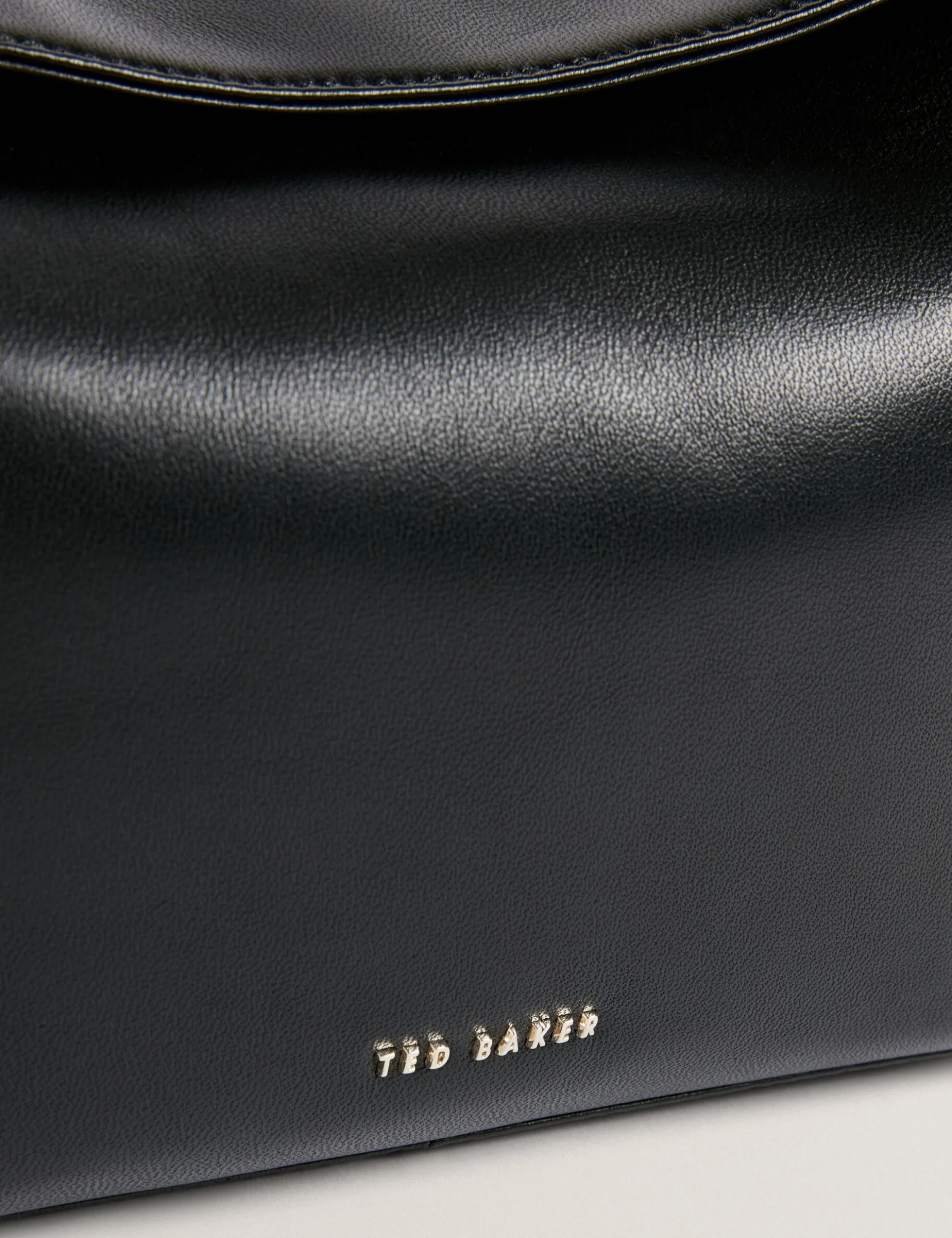 Schultertasche aus weichem Leder mit Schleife und Knoten