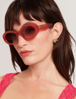 Sonnenbrille mit klobigem, ovalem Schleifendetail