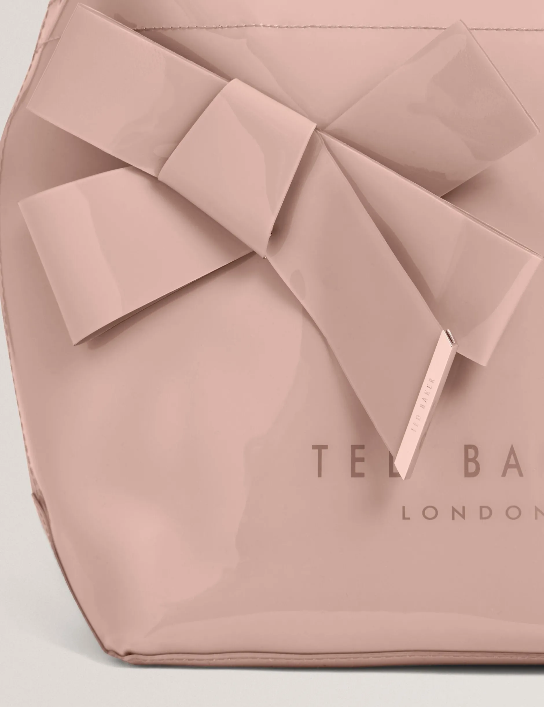 Tragetasche mit kleinem Knoten-Schleifen-Vinyl-Symbol