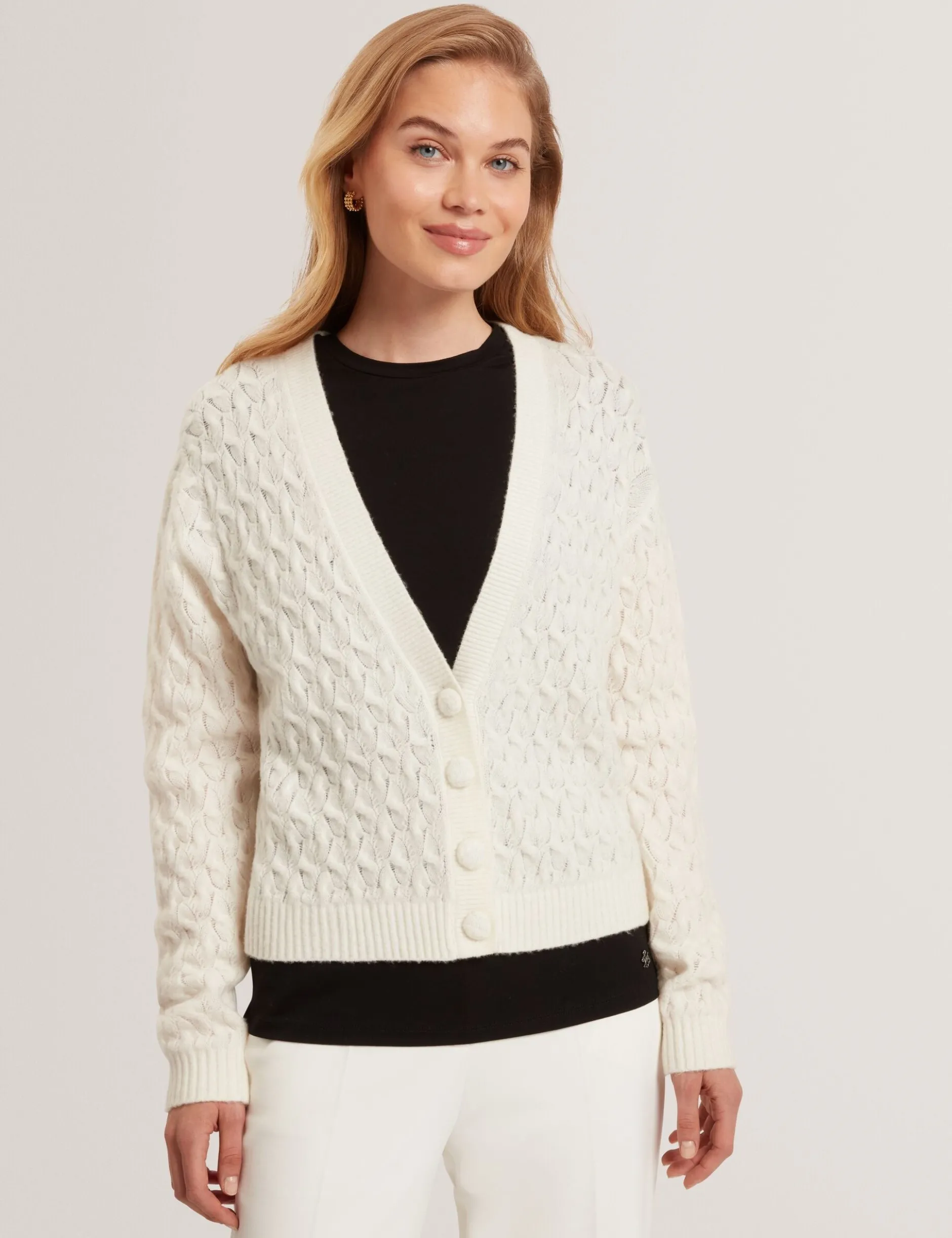 Zopfstrick-Strickjacke aus Wolle mit V-Ausschnitt